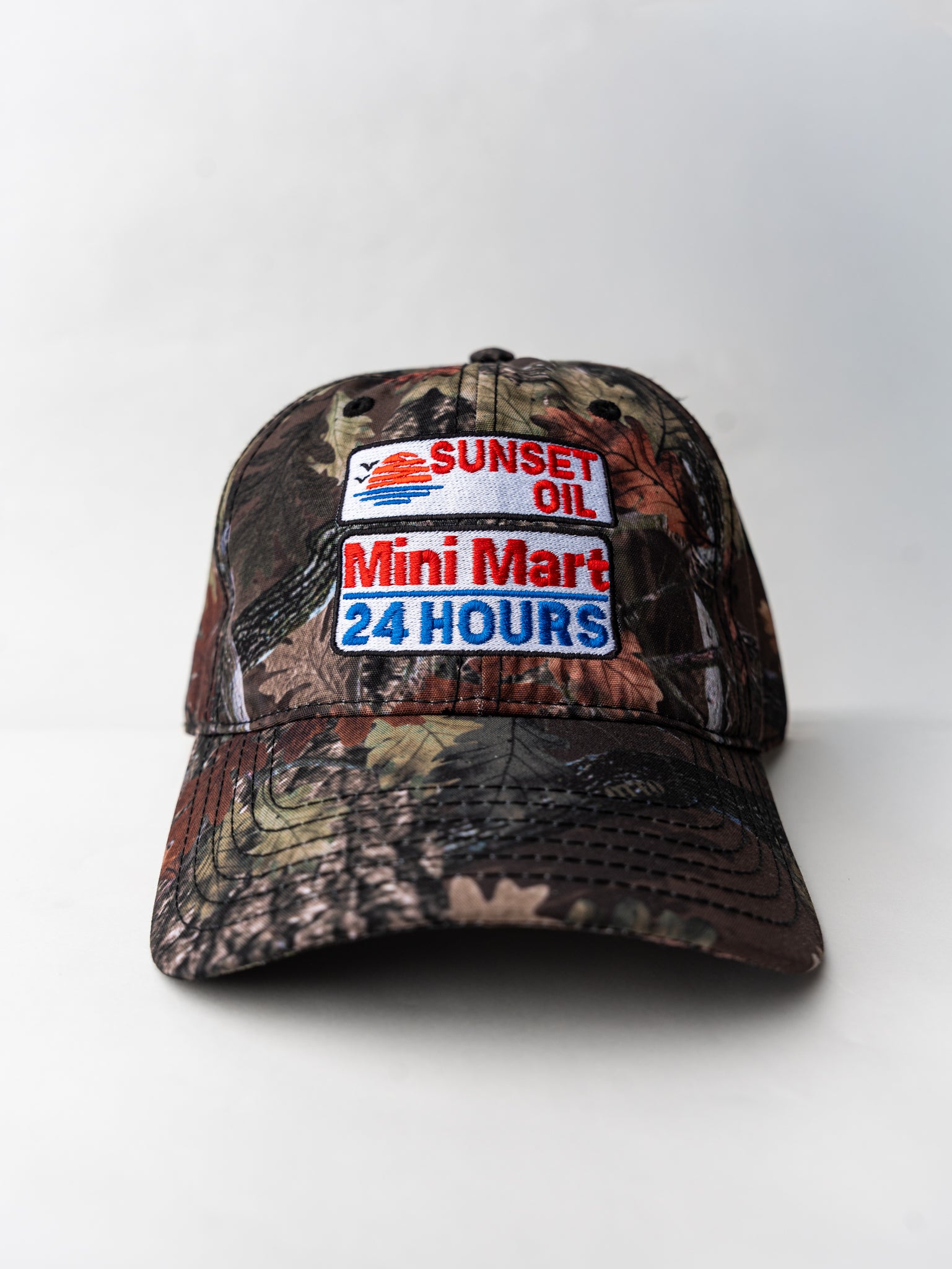 Sunset Oil Mini Mart Dark Camo Baseball Fit