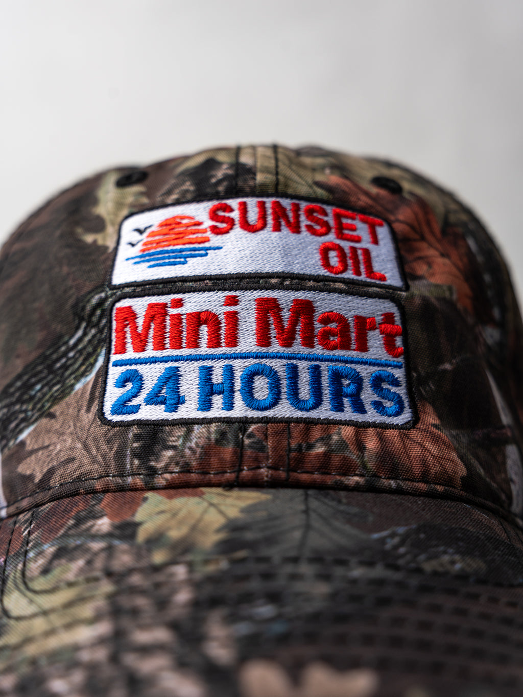 Sunset Oil Mini Mart Dark Camo Baseball Fit