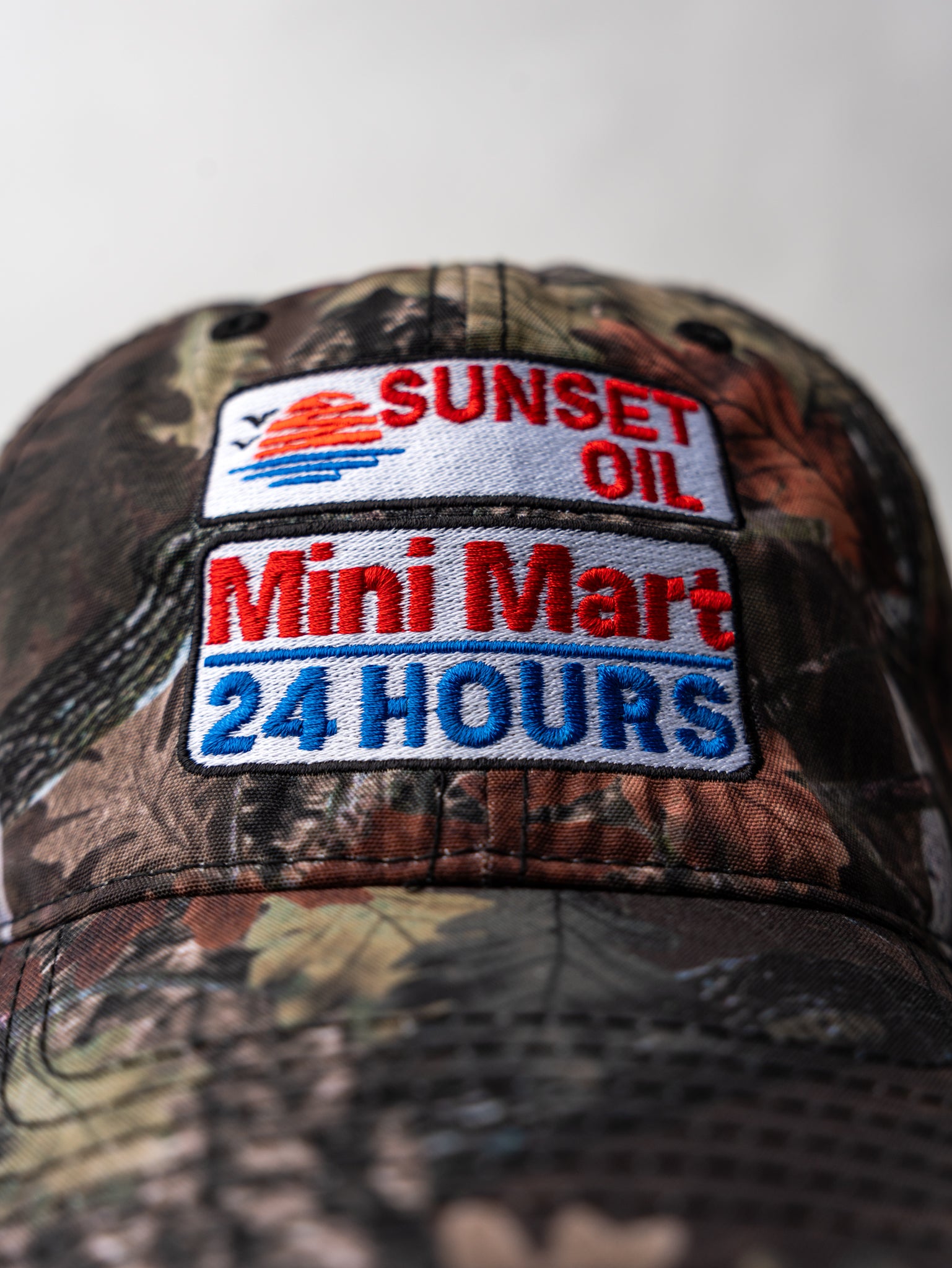 Sunset Oil Mini Mart Dark Camo Baseball Fit