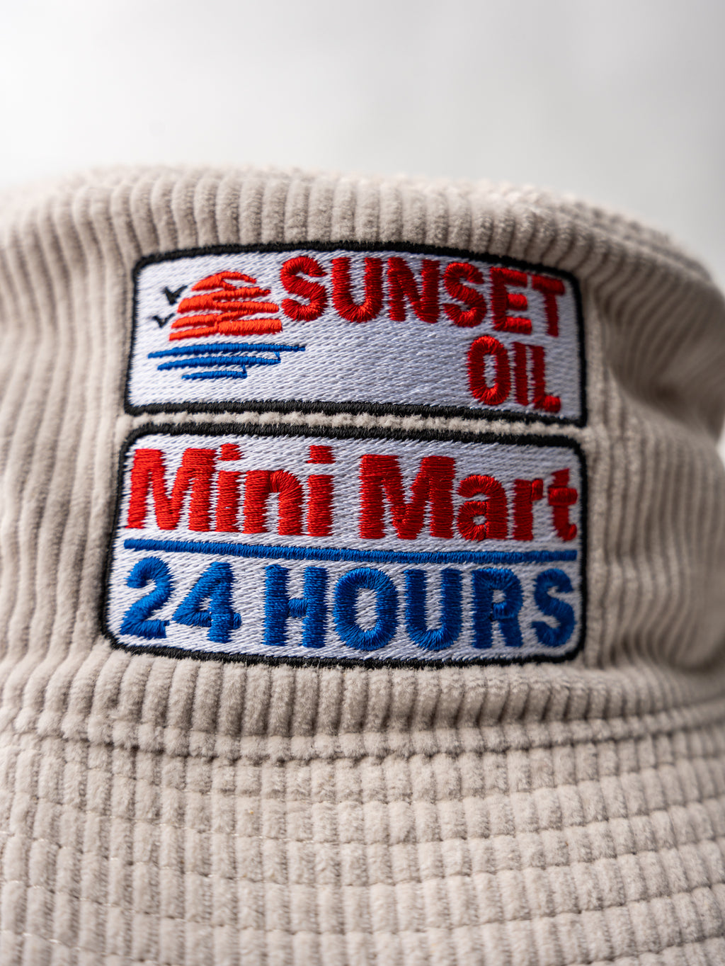 Sunset Oil Mini Mart Bone Cream Bucket Hat