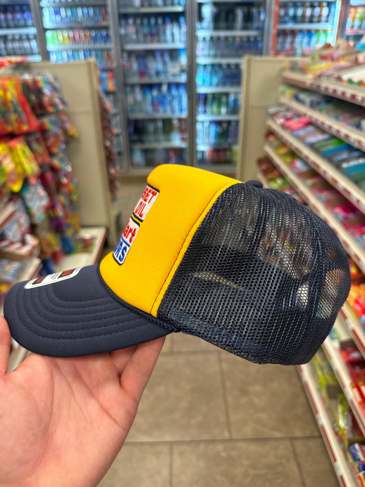 Sunset Oil Mini Mart Navy/Gold/Navy Trucker Hat