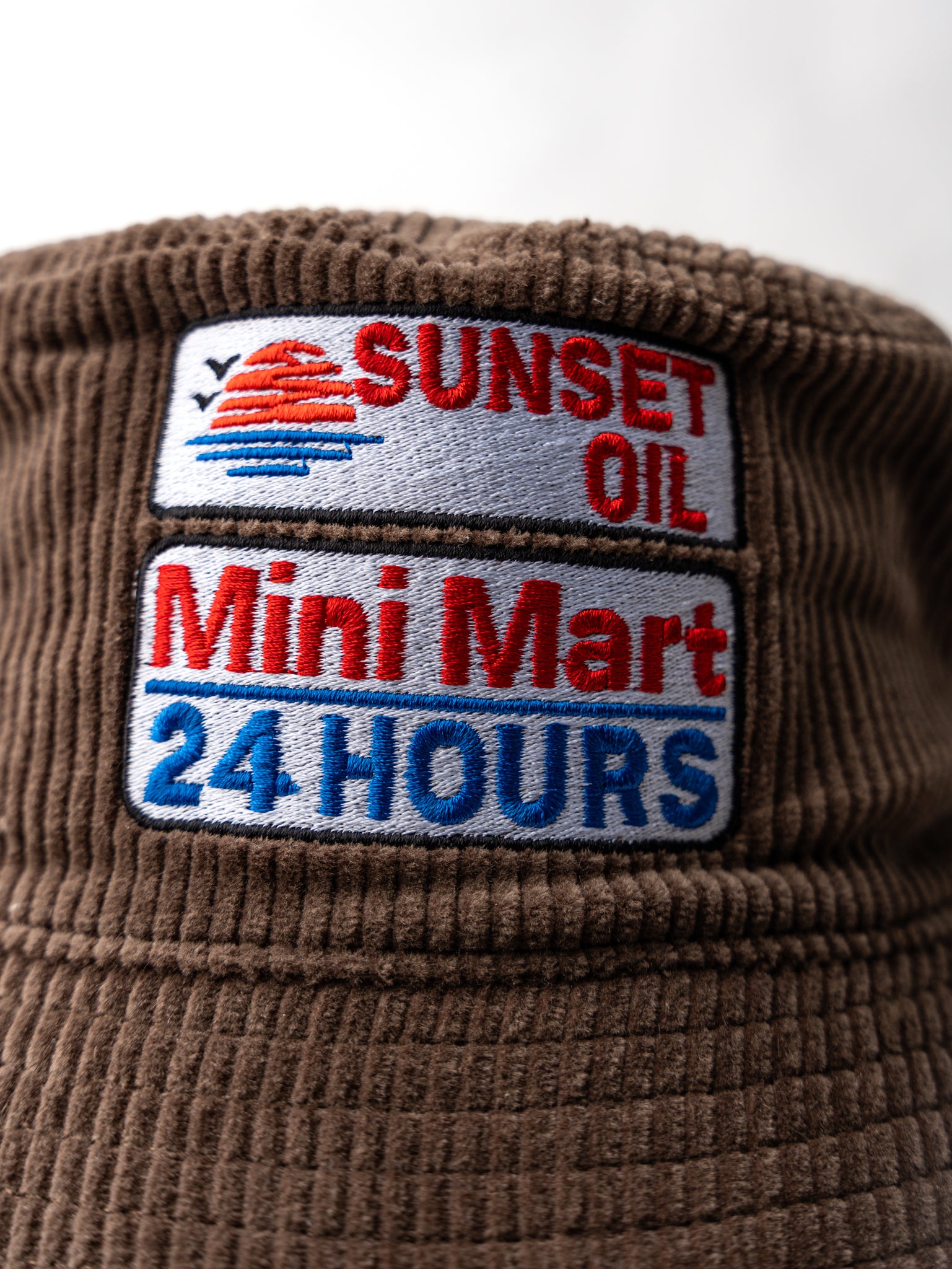 Sunset Oil Mini Mart Brown Bucket Hat