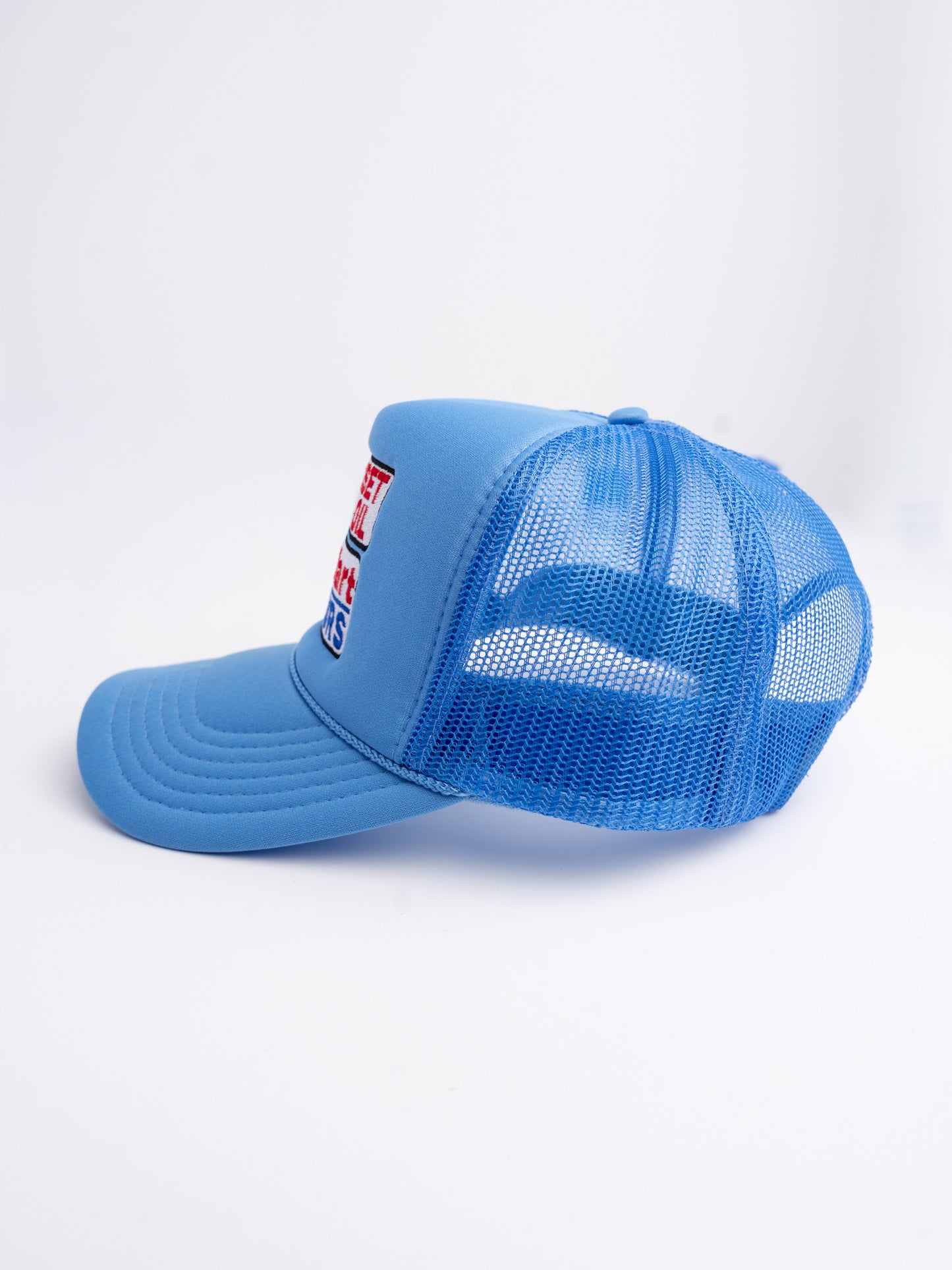 Col Blue Trucker Hat ™
