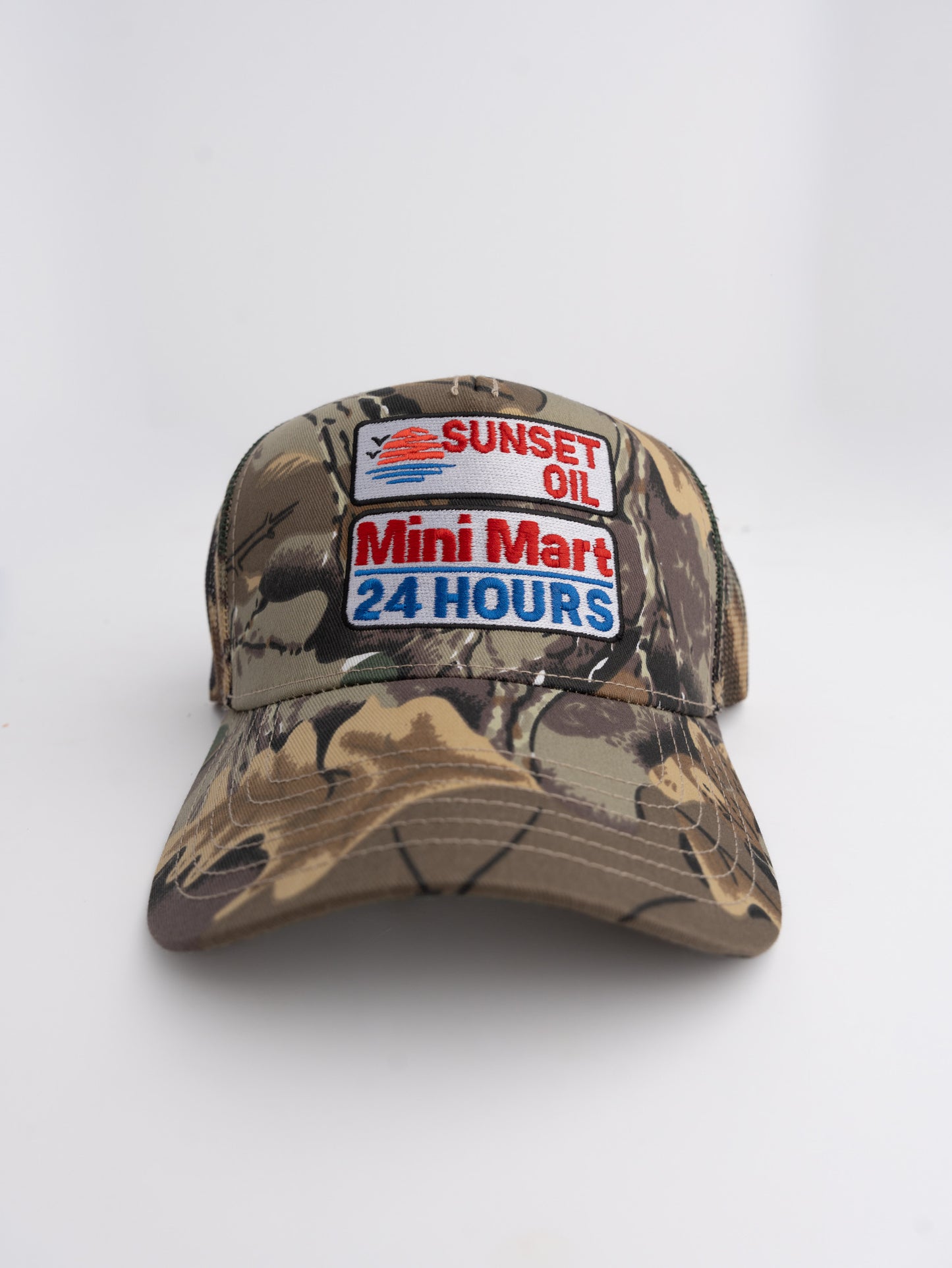 Camo Mesh Trucker Hat ™