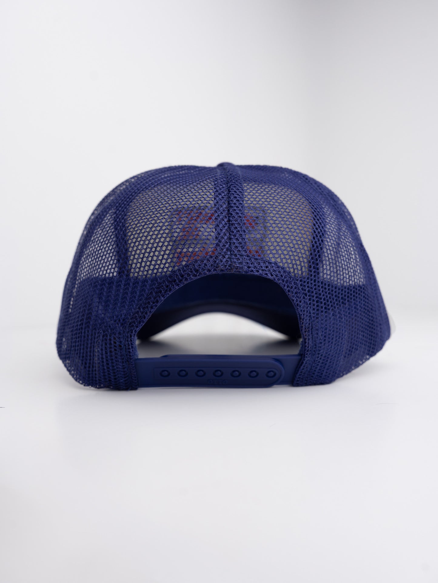 White/Purple Trucker Hat™