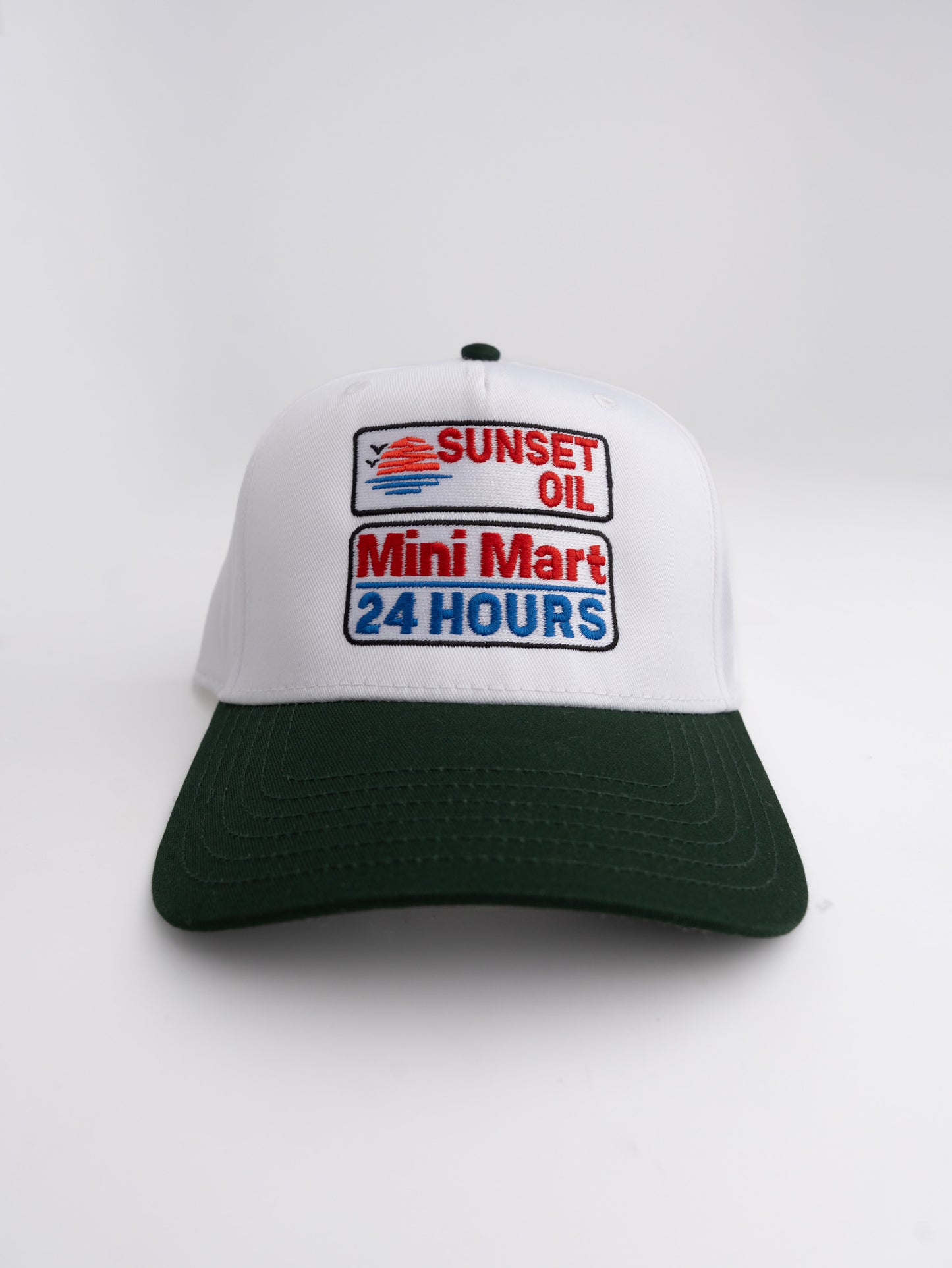 White/DKGreen Baseball Hat ™