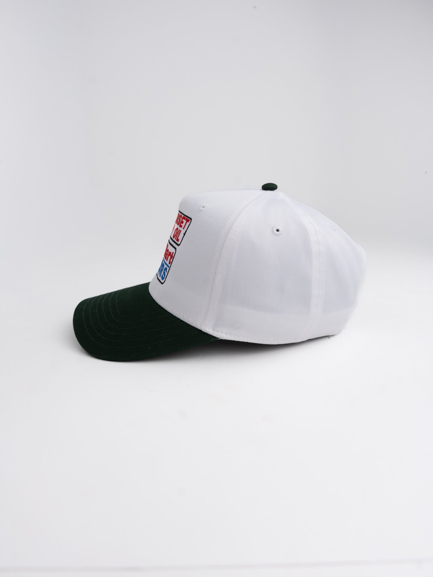 White/DKGreen Baseball Hat ™