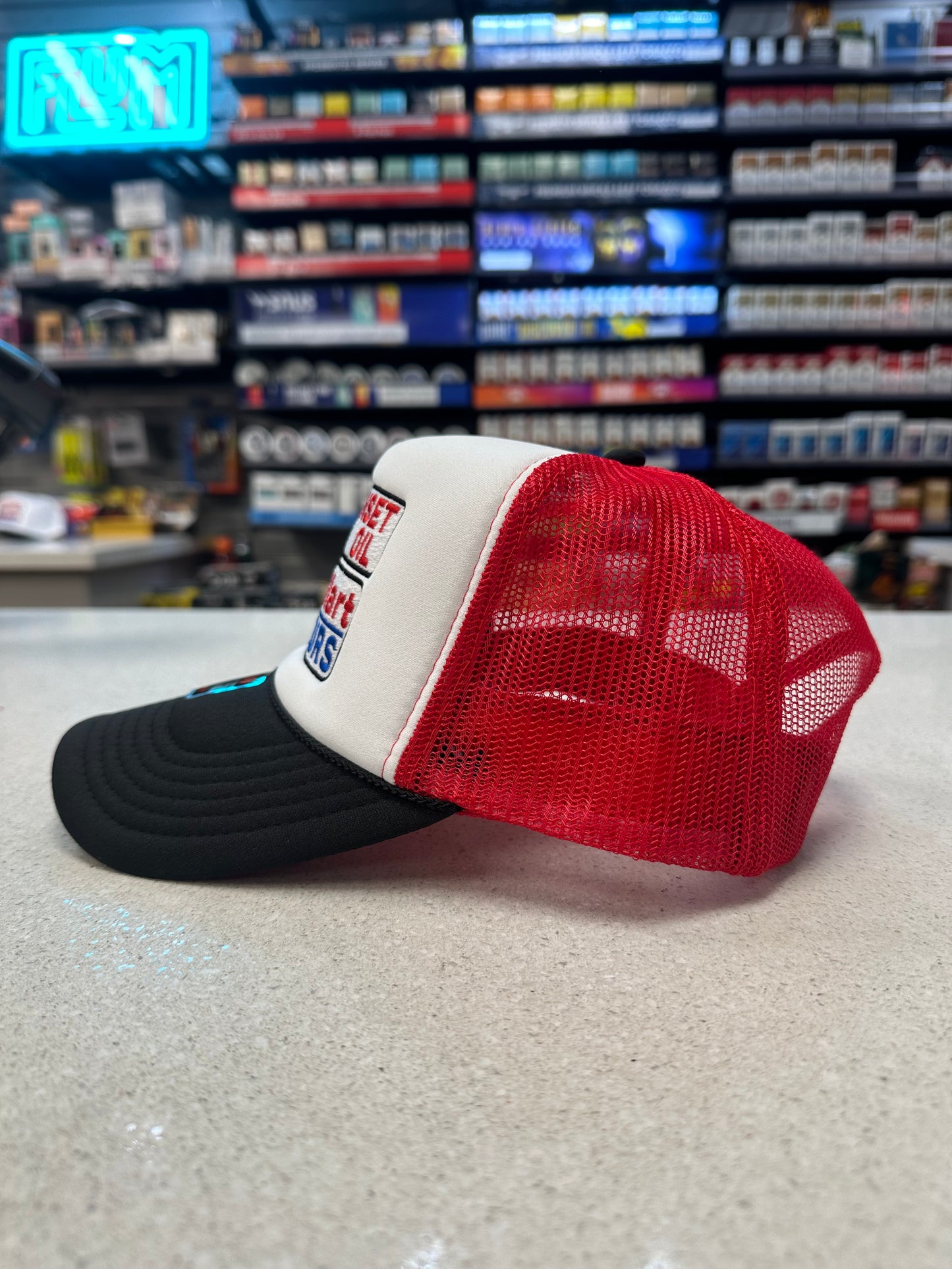 Sunset Oil Mini Mart Black/White/Red Trucker Hat