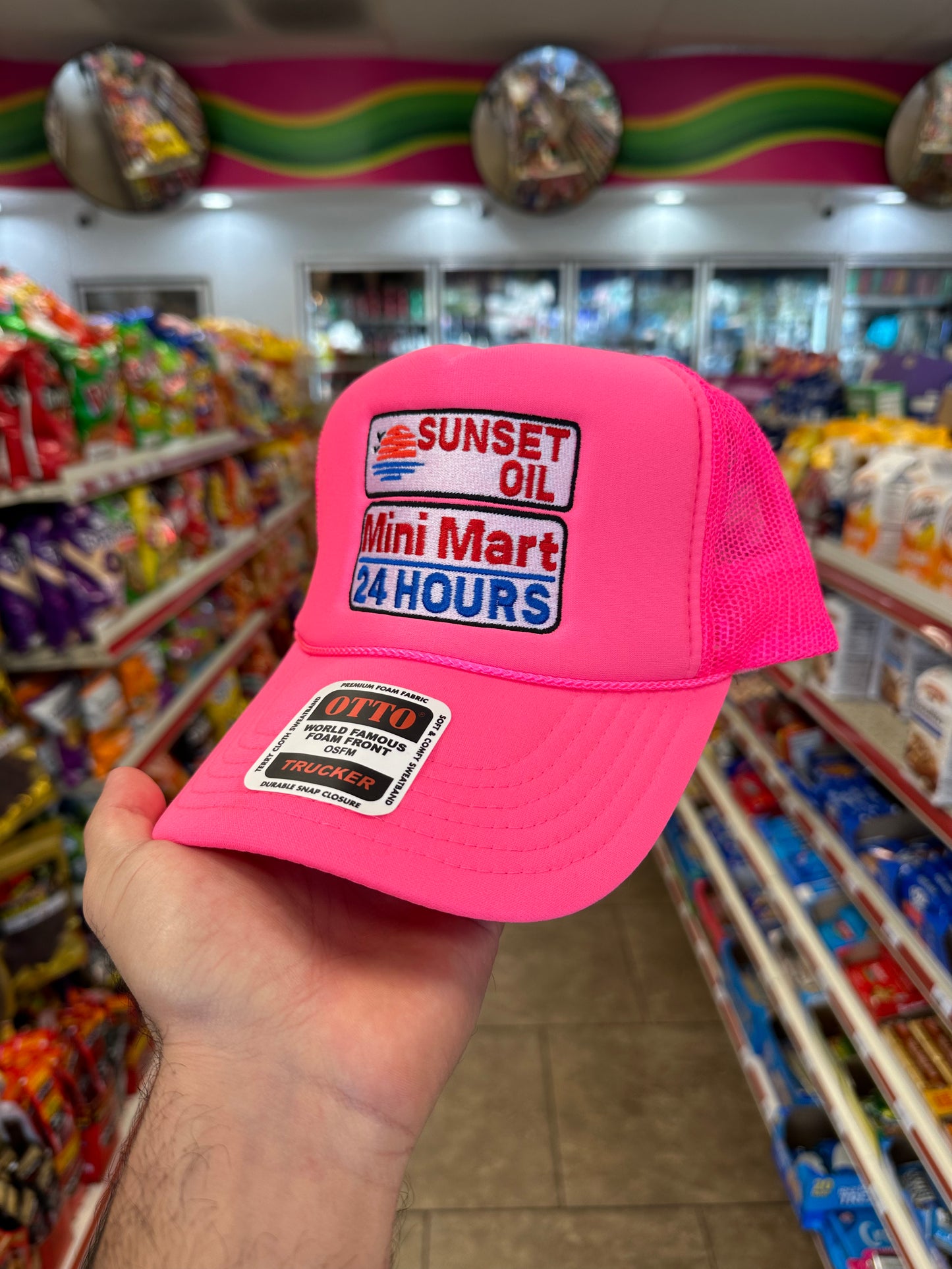 Sunset Oil Mini Mart Neon Pink Trucker hat