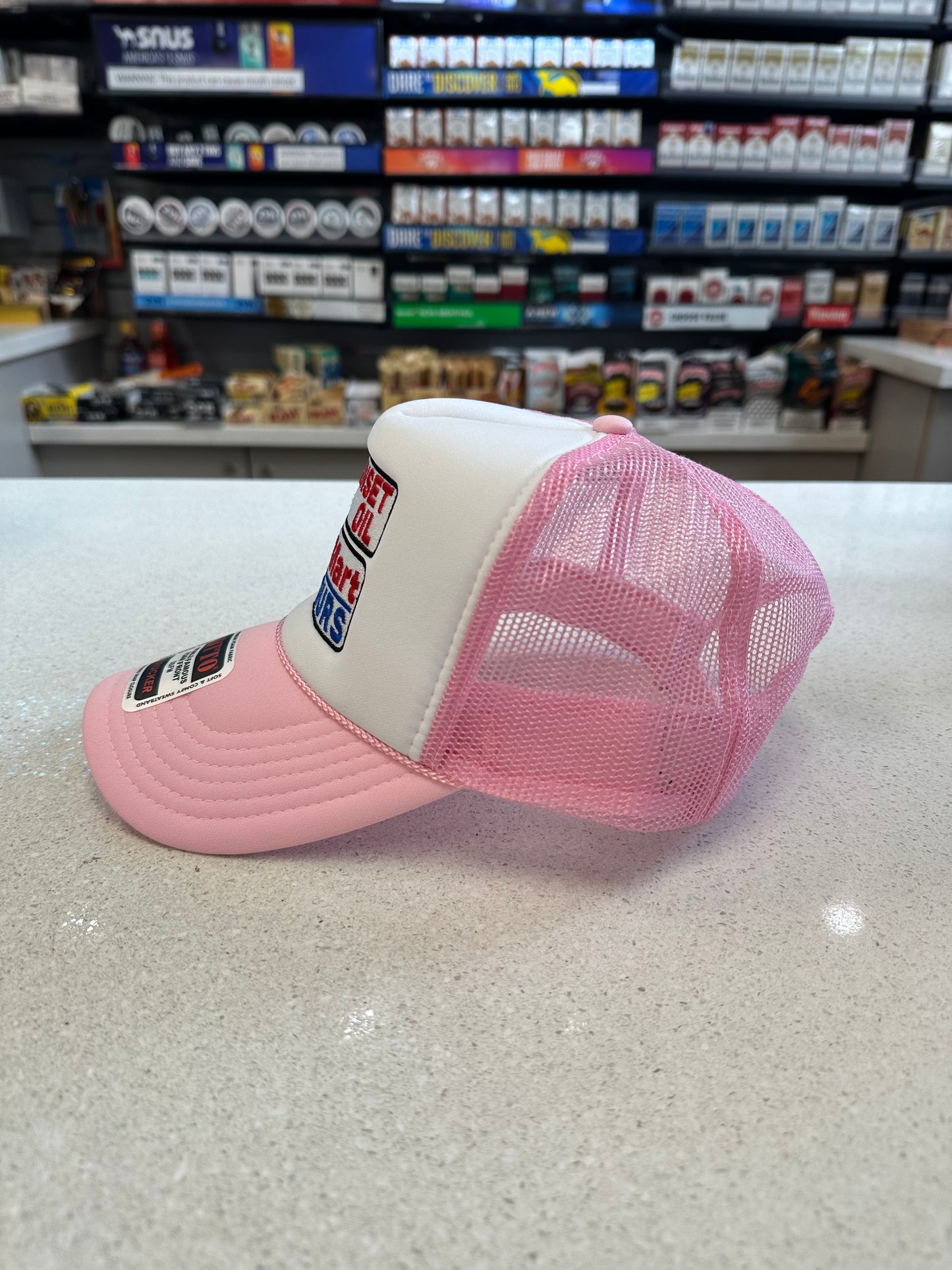 Sunset Oil Mini Mart Pink and White Trucker Hat