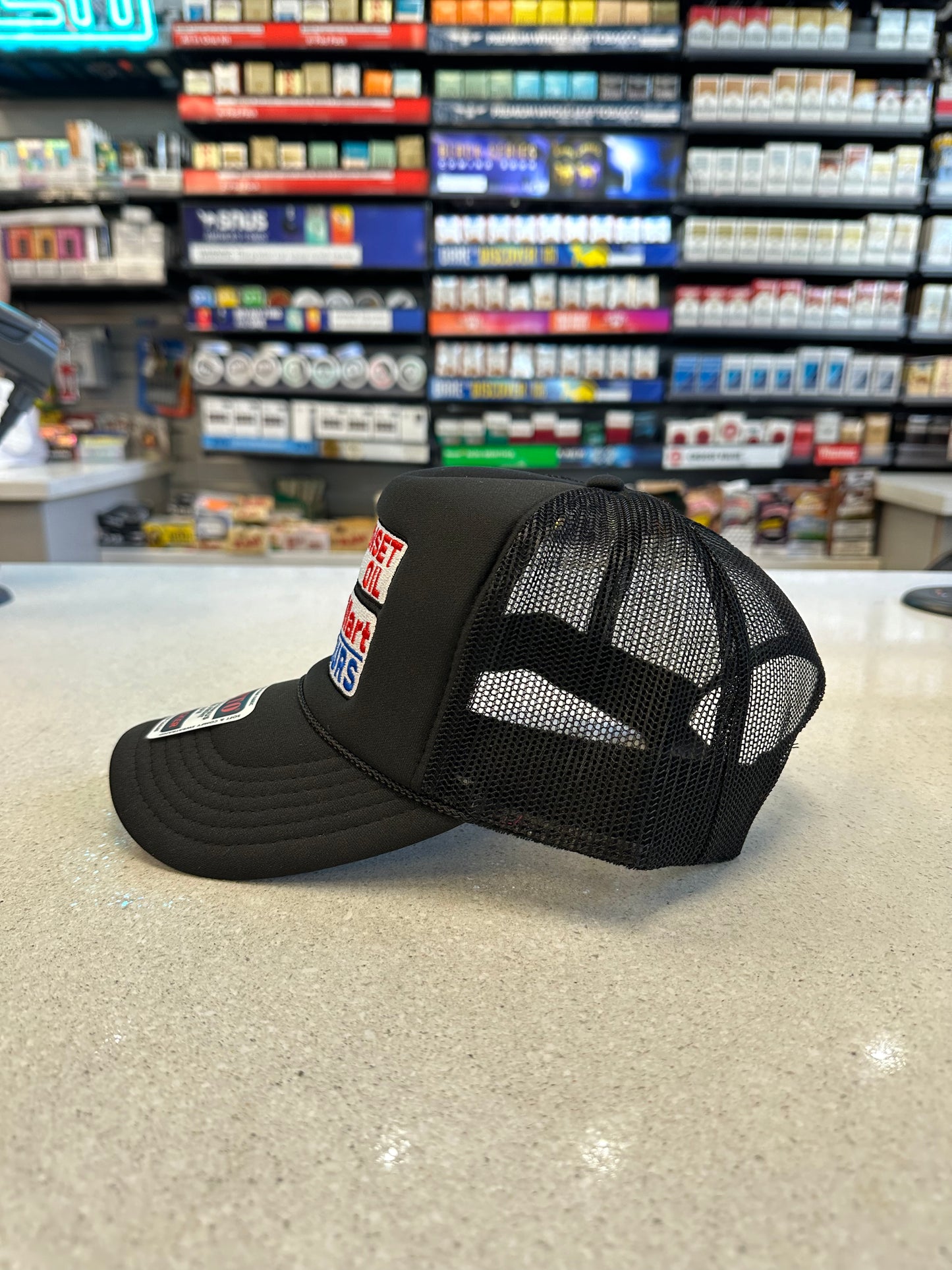 Sunset Oil Mini Mart Black trucker hat